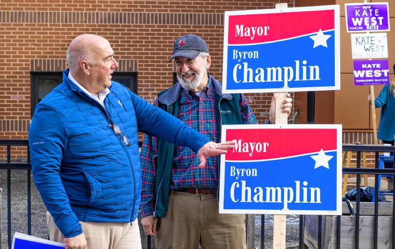 Mayor Jim Bouley talks with candidate Byron Champlin outside the Ward 5 polling place at Christa McAuliffe Elementary. Champlin won a three-way race securing 74% of the city’s votes to the first new mayor in over a decade. 