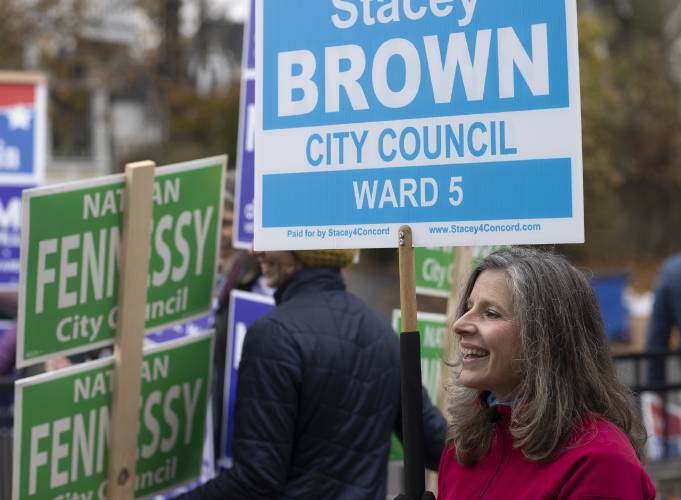 Stacey Brown campaigned outside the Ward 5 polls at the Christa McAuliffe School in Concord on Tuesday.
