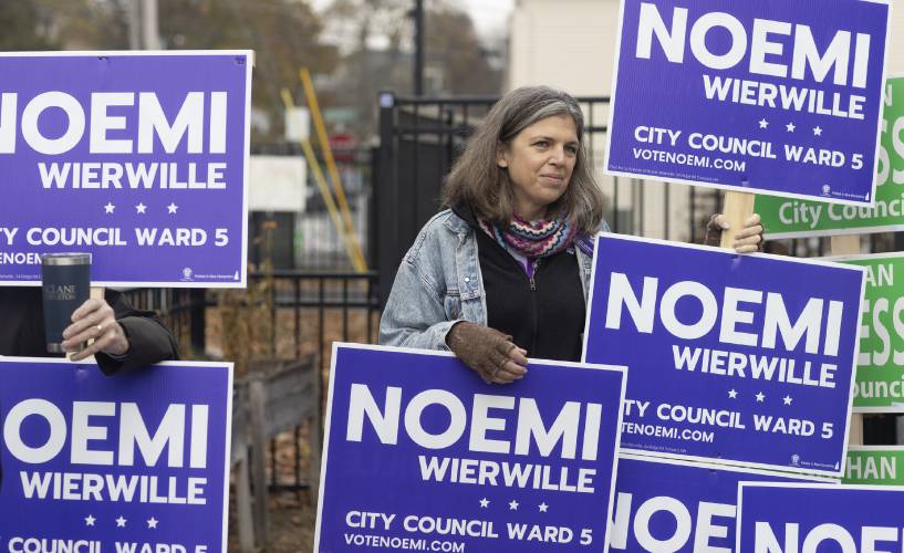 Noemi Wierwille outside Ward 5’s polls at the Christa McAuliffe School in Concord on Tuesday.