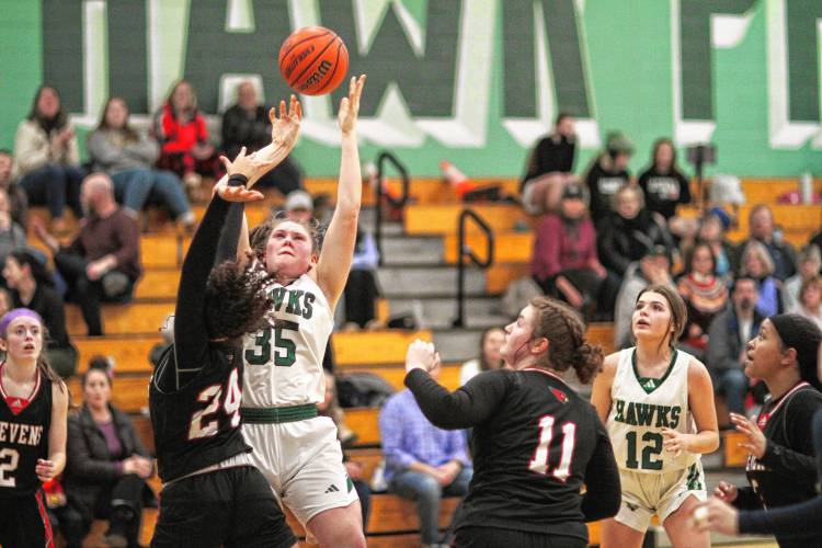 Hawks junior Sydney Westover attempts a put-back layup during the first half of Friday’s 45-40 win over Stevens.