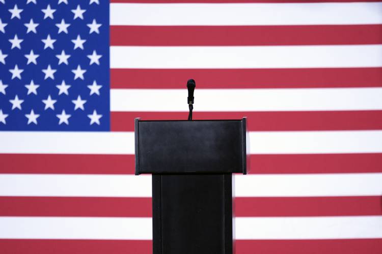 The stage it set for Republican presidential candidate Florida Gov. Ron DeSantis before a caucus night party, Monday, Jan. 15, 2024, in West Des Moines, Iowa. (AP Photo/Charlie Neibergall)