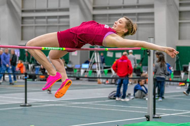 Concord’s Ella Goulas clears the high jump bar at the NHIAA Division I indoor track and field championship on Sunday at Plymouth State. Goulas won the high jump title by clearing 5-4.
